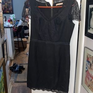 REBECCA TAYLOR elegant black dress. Size 10.  Dress has small lace sleeves
